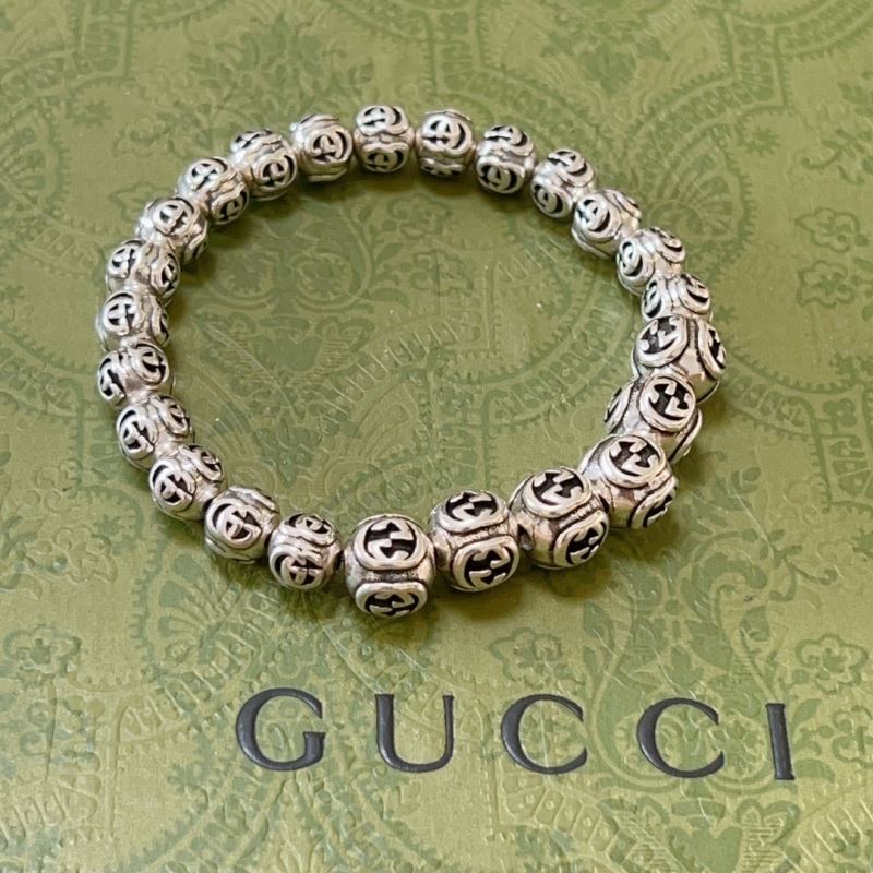 G*u*i bracelets